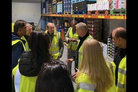 Jim Dew shows the group around the brand-new Harwoods of London unit